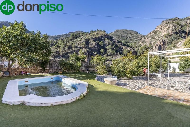 Foto ee9e200d-e5bc-485a-a2a3-a0b6ef6140b9. Casa encantadora casa de una planta con amplio terreno y piscina en guájar faragüit en Guájares (Los)