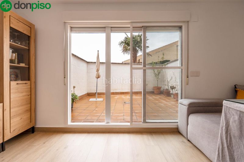 Foto f1236c62-7773-4cb8-b9e9-738b69c5534b. Casa adossada amb aparcament a Ogíjares