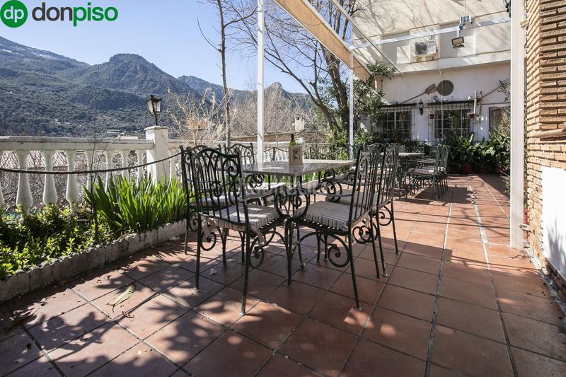 Foto 072e1ca2-f9cf-4f6c-b178-bf32405b365f. Edificio in Güéjar Sierra