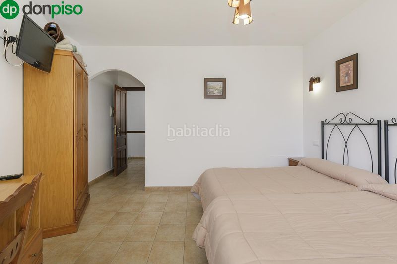 Foto d01dcda2-5344-45c1-bc9c-adc8c33216bc. Edificio in Güéjar Sierra