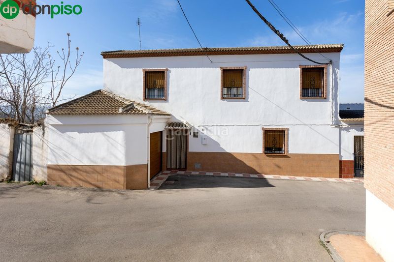 Foto f77339e2-4d7e-4a4a-9921-894d9271fbce. Casa amb aparcament a Moraleda de Zafayona