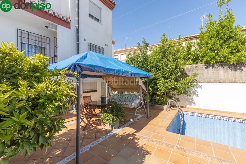 Foto 242ab695-2167-4914-ad9a-87c44d134a66. Casa aparellada amb calefacció aparcament piscina a Gabias (Las)