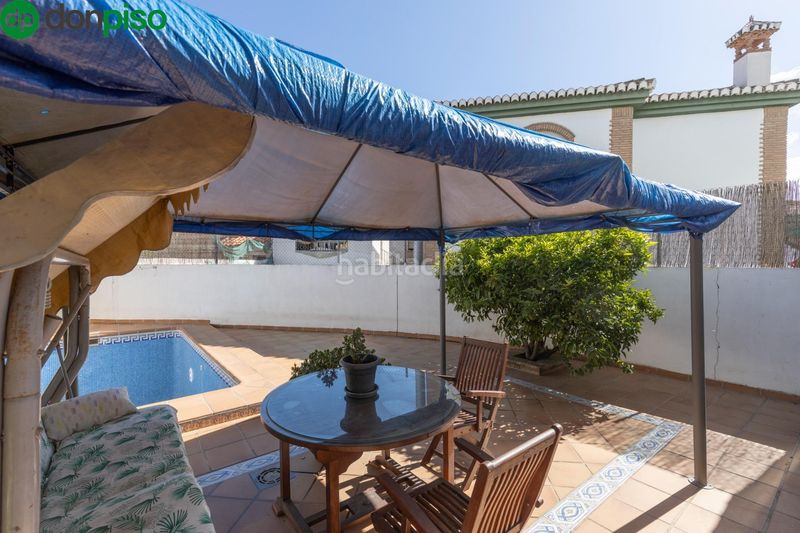 Foto d95a280c-253b-4048-9f56-74311842b498. Casa aparellada amb calefacció aparcament piscina a Gabias (Las)