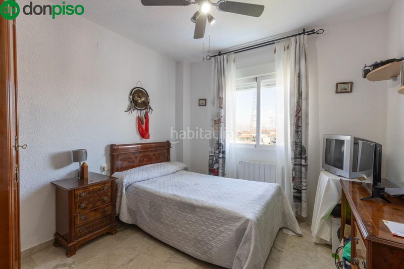 Foto f2e4ff96-00e1-413c-8e7a-f670509e1491. Casa aparellada amb calefacció aparcament piscina a Gabias (Las)