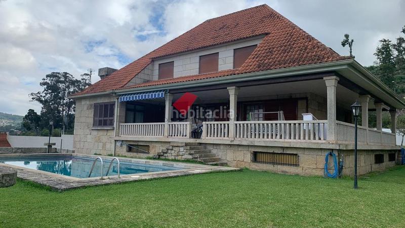 Foto 926f8fd9-1bfc-4050-8cf4-baf471c6c749. Maison avec chauffage parking piscine dans Gondomar