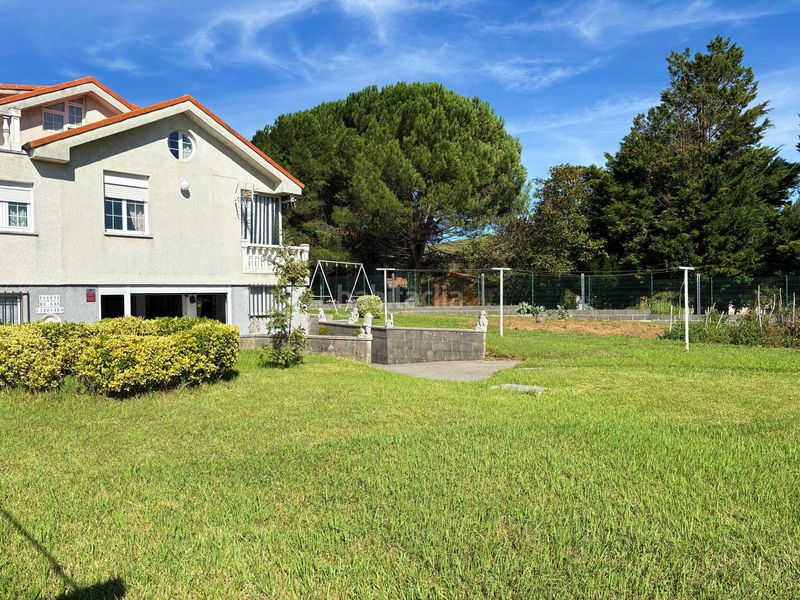 Foto ce326bec-4f8d-470c-a4c3-41e1dfedf131. Casa con parcheggio in Suances