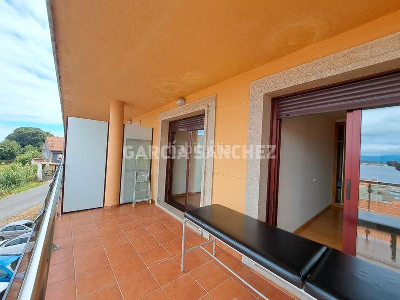 Foto 9e5f4141-344e-42ee-9a84-208d2d817ae8. Apartament amb aparcament a Boiro