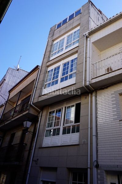 Foto 9808fddb-2027-49d7-a350-8ebbe6cacc12. Casa adosada en rúa da praciña 32 en Rianxo