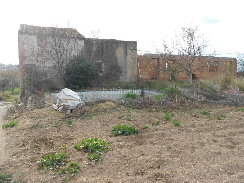 Foto 45e97bbc-5edf-471a-94c2-a85a4faea7e9. Finca rústica terreno con edificación en venta en Valls
