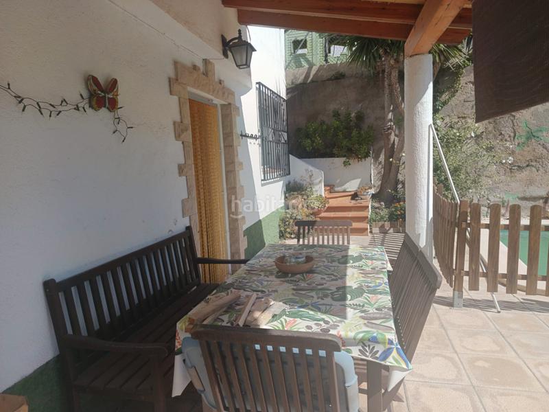 Foto 29172358-e36d-4aa8-b186-67bc2826c47b. Casa amb xemeneia piscina a costa Cunit - els jardins - els rosers Cunit