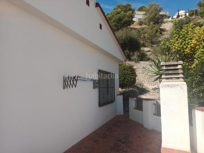 Foto 55a41f73-483f-4bed-8ae0-f31dfe33f224. Casa amb xemeneia piscina a costa Cunit - els jardins - els rosers Cunit