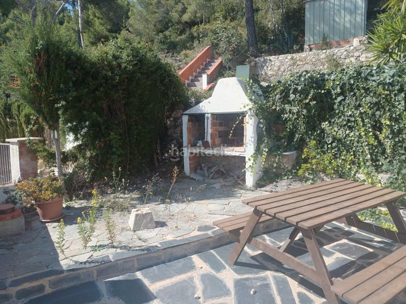 Foto 6dcda1ed-9eec-4f61-b86e-81abb09b0d96. Casa amb xemeneia piscina a costa Cunit - els jardins - els rosers Cunit