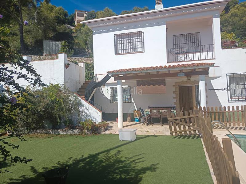 Foto b6b0dfde-b374-46bc-80af-00ea0d1ce243. Casa amb xemeneia piscina a costa Cunit - els jardins - els rosers Cunit