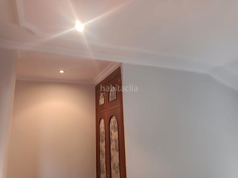 Foto acff1ec0-5501-4a86-beb2-7e4f9be361d2. Chalet with fireplace heating parking pool in Salinas Castrillón