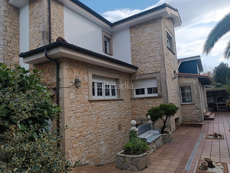 Foto a04b1caf-ce9f-4f22-9675-e88a1274d91e. Chalet con camino riscaldamento parcheggio piscina in Castrillón