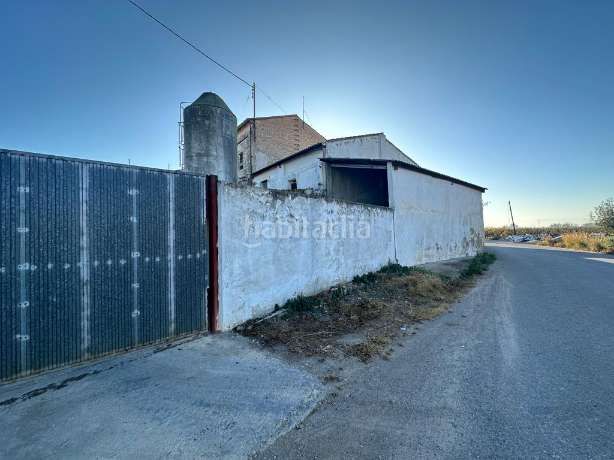 Foto c2158e9f-0adc-474b-943f-a5944a86fac3. Finca rústica a poligono 22 a Guadassuar