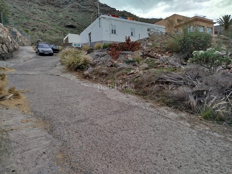 Foto a983abed-d635-49c0-b314-95b897ca5c81. Terreny residencial a Mogán pueblo Mogán