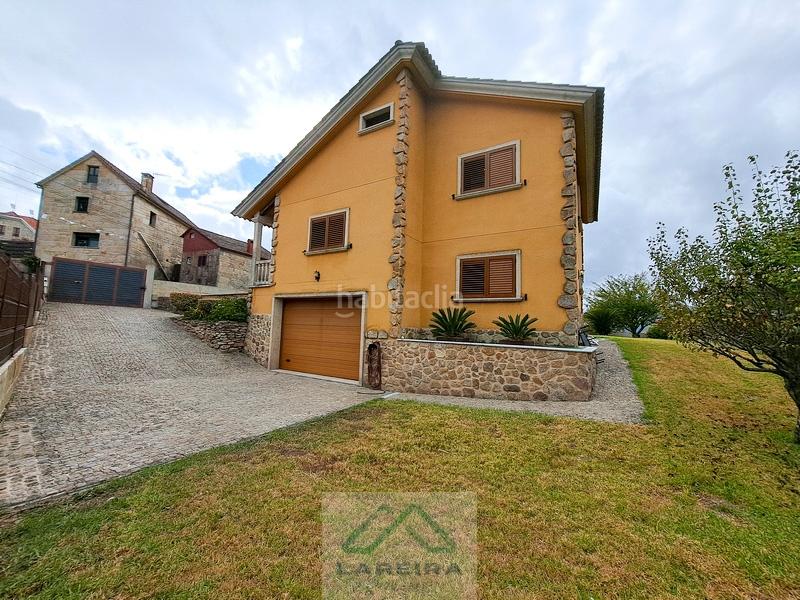 Foto 0ecf0f8d-944d-426c-9d4c-9a2003b852fd. Casa  con piscina. en Redondela