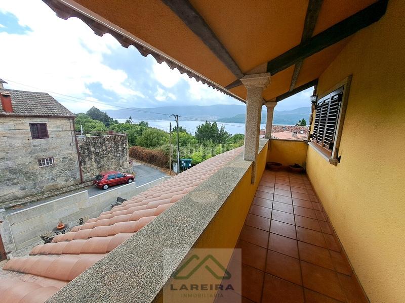 Foto 3b5f788a-b55e-47a0-a03f-5b65fa2fd474. Casa  con piscina. en Redondela