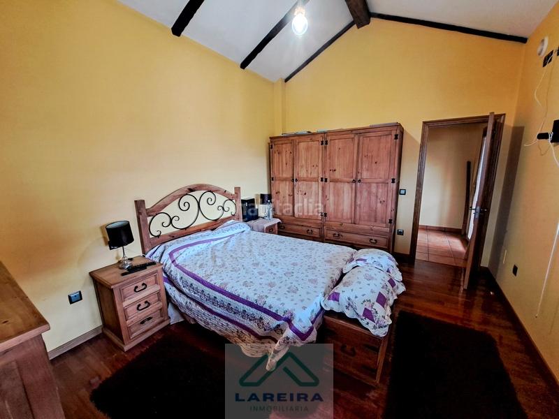 Foto 9b8a9173-91a2-41c1-a372-4d2aa537215b. Casa  con piscina. en Redondela