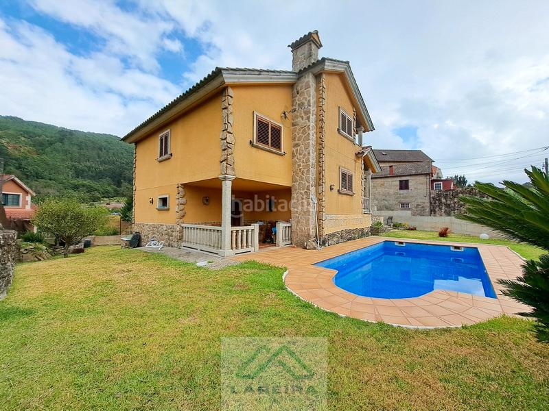 Foto 9b96c5c6-f451-422b-96e7-8d9ddc829383. Casa  con piscina. en Redondela