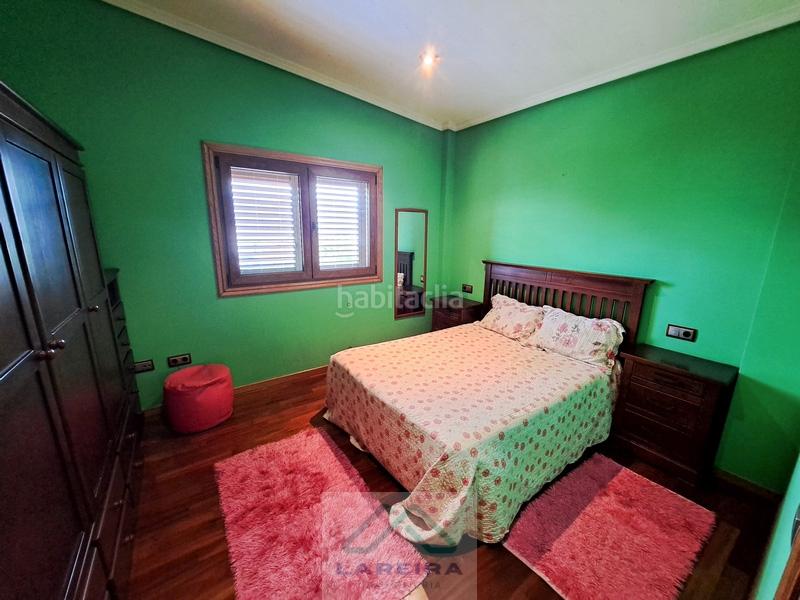 Foto c3e5f79d-abea-4662-be06-45bae6395d63. Casa  con piscina. en Redondela