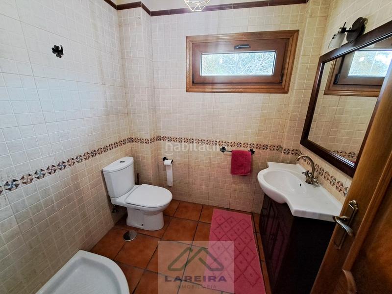 Foto e5106a78-bfc9-47c1-8b1f-f7d5a3d64908. Casa  con piscina. en Redondela