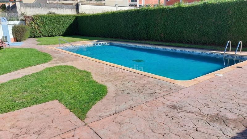 Foto 4cbd73eb-299d-4f90-b0a1-e50d2c8bbe20. Casa adossada amb calefacció aparcament piscina a Sanxenxo