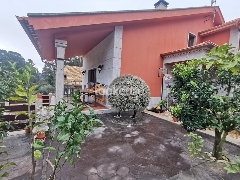 Foto 16dcd07b-d318-4c49-86ad-5e930a09d859. Xalet amb xemeneia calefacció aparcament a Dorrón Sanxenxo