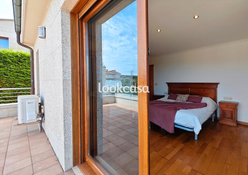Foto 9fd2610e-360c-4251-8280-307c511e5200. Chalet - Noalla. chalet a 500 metros del mar y playas, con jardín y terrazas vistas mar. en Sanxenxo