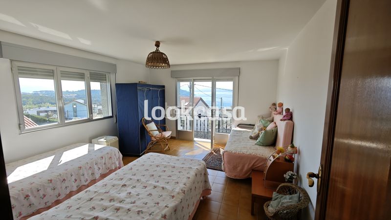 Foto e8d1a4e8-db6c-4b69-9358-d8b4f9bdae84. Casa amb xemeneia calefacció aparcament a Arra Sanxenxo