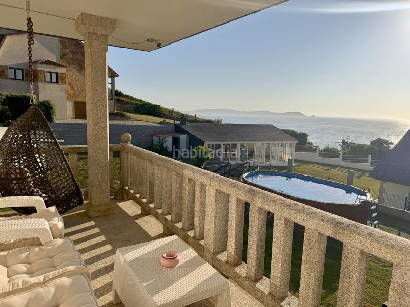 Foto aed6db56-ca07-45e0-bcbf-9886fc52b9ac. Casa amb calefacció aparcament a Noalla Sanxenxo