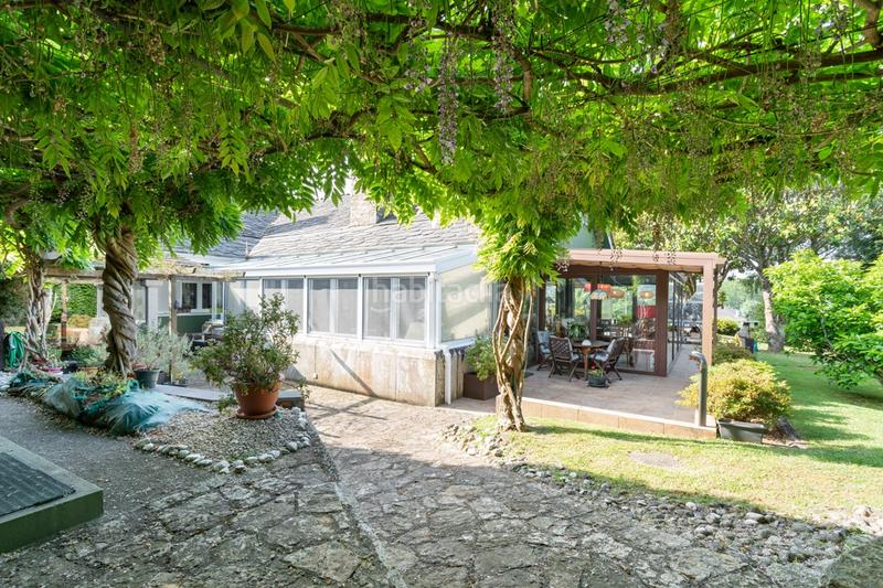 Foto 361c0108-06cd-4a83-a719-88304d67b875. Casa con riscaldamento parcheggio piscina in Nós Oleiros