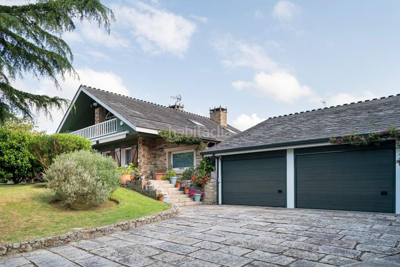 Foto 3ebb5eb7-9b33-492f-8f2f-3e89303656cf. Casa con riscaldamento parcheggio piscina in Nós Oleiros