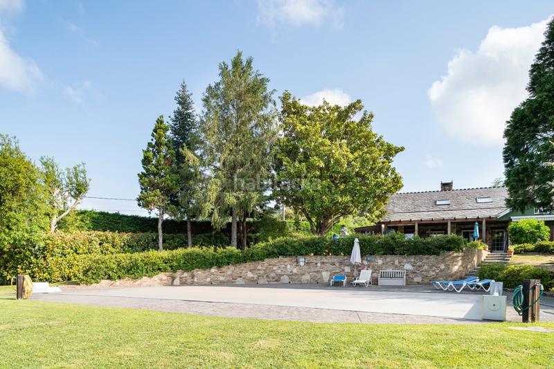 Foto a8a2a5d2-4d11-4d29-8f3b-d20897056fec. Casa con riscaldamento parcheggio piscina in Nós Oleiros