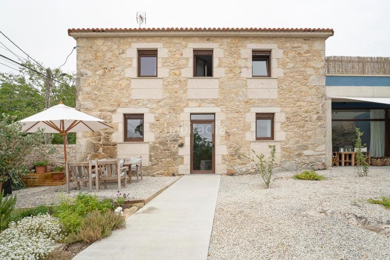 Foto 434d4e21-13fd-4e82-b5ef-f1ecf12e322f. Casa  de piedra rehabilitada próxima a la playa de razo en Carballo