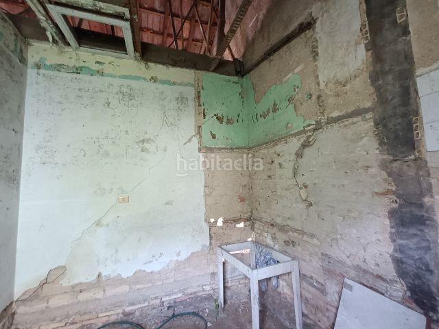 Foto c77f80a4-3707-4792-9063-d70d301a0e7a. Casa adossada a Lavadores Vigo