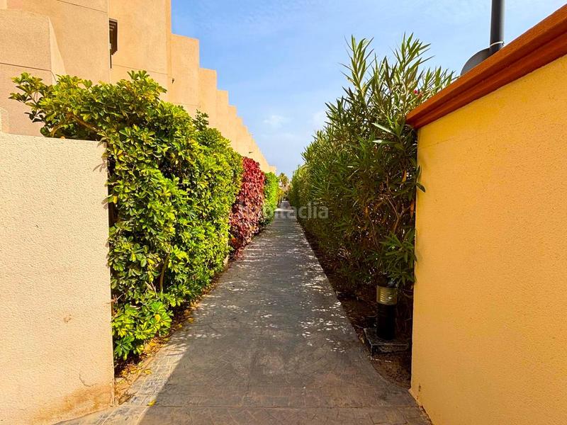 Foto c4d13bc9-e341-4186-ac3b-c3f4862c6e33. Dúplex  con terraza, vistas al mar y piscina, a solo 20 metros de la playa de la tejita en Granadilla de Abona