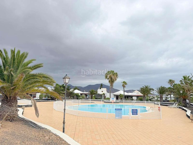 Foto 133f7478-a794-4bf7-9131-ac0387d32bd7. Casa aparellada amb aparcament piscina a Playa Blanca Yaiza