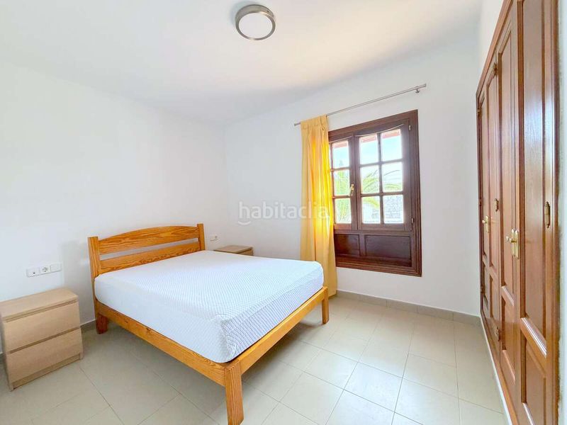 Foto 495df9cd-c972-4b18-99bd-9436fc4ae019. Casa aparellada amb aparcament piscina a Playa Blanca Yaiza