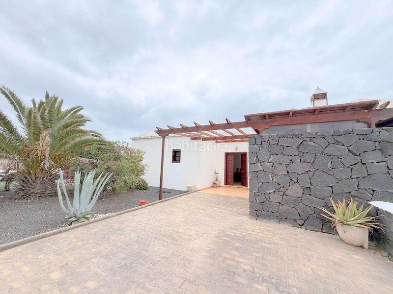 Foto 50ca4925-e1c8-4c60-9537-8a526b76a871. Casa aparellada amb aparcament piscina a Playa Blanca Yaiza