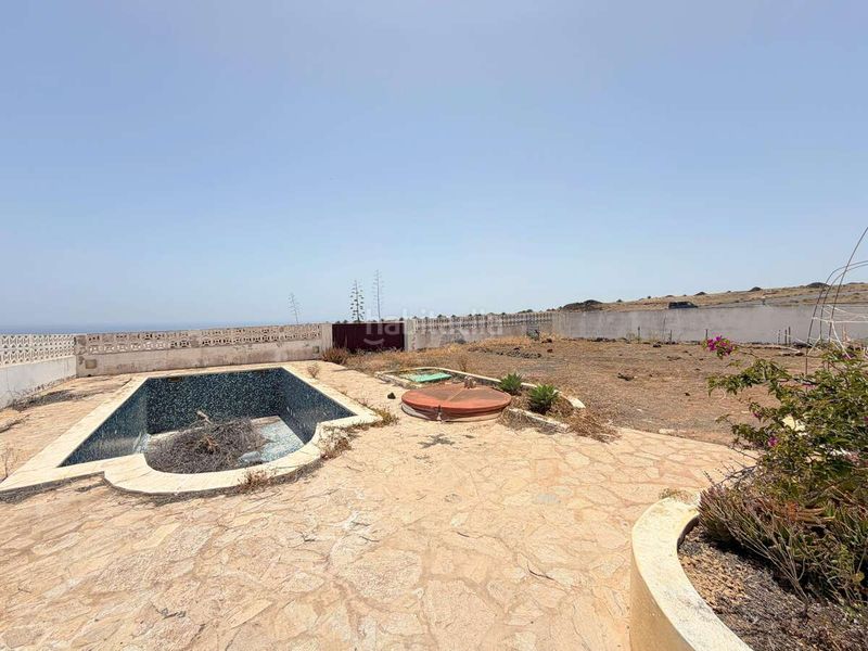 Foto 504ee6c2-5f37-43a7-b709-2a1c7e85057a. Casa amb aparcament piscina a Güime San Bartolomé