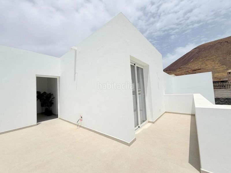Foto 11e8c72a-a72e-4da3-82a2-99538806ce79. Xalet amb aparcament a Tahiche Teguise