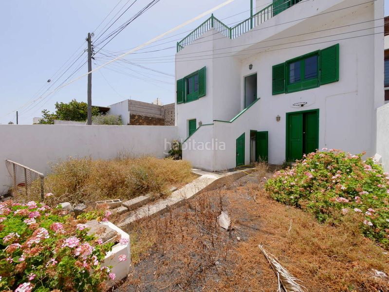 Foto 5c68fa4c-80f1-4815-99d1-54fcbde36f03. Casa amb aparcament a Haría pueblo Haría