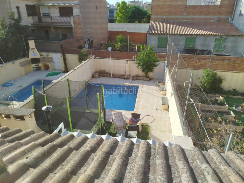 Foto 1a2490c8-80b7-4e93-9ce5-c7b17b81492b. Casa adossada amb calefacció aparcament piscina a Binéfar