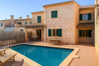 Casa adossada a Santa Eugènia