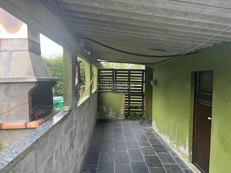 Foto e6bec3b6-0102-43e0-b724-dd2df729dafd. Reihenhaus mit heizung parking in Valdoviño