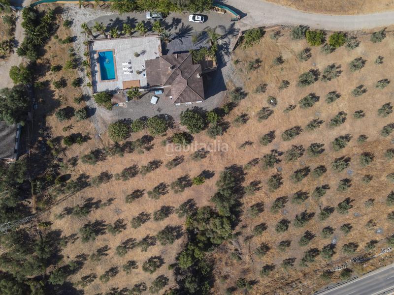 Foto 22a6ff0a-d5e9-4f30-9811-577cdf36b7b0. Masia amb aparcament piscina a Guaro