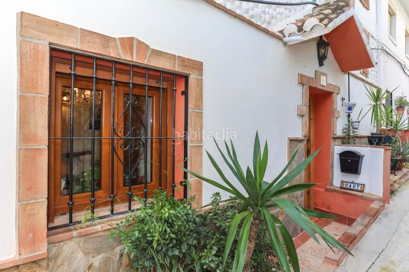 Foto 4c0a5924-64b2-4a62-99dd-da7178fafc3d. Casa adosada construcción de excelente calidad en Alozaina