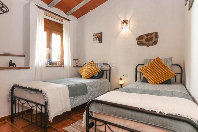 Foto 7a2f6e90-23c2-4429-aabf-ec258dbef53a. Casa adosada construcción de excelente calidad en Alozaina